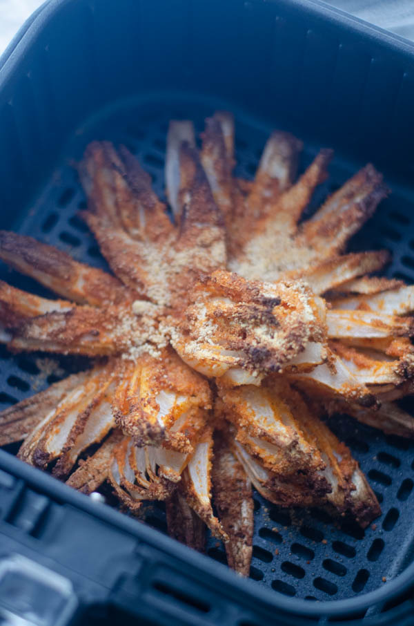 A delicious appetizer for special occasions, this air-fried blooming onion is a much healthier version of a favorite crunchy treat. Paleo, vegan, gluten-free.