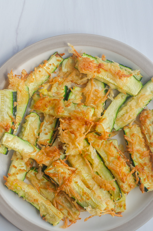 Crispy air-fried zucchini fries are a delicious appetizer or side dish. Perfect for any keto, low-carb or primal meal.
