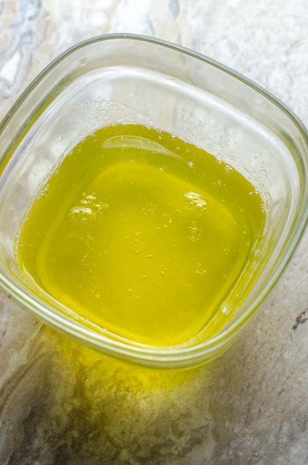 If you have a dairy sensitivity, or are attempting a round of Whole30, this easy homemade ghee is delicious! Keto, paleo, dairy-free.