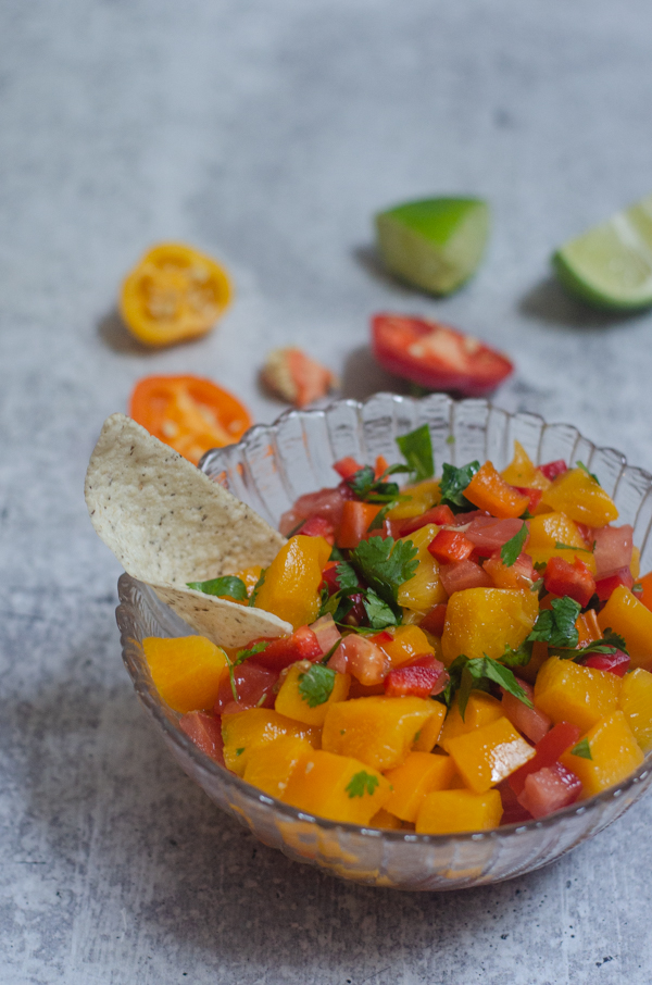 This recipe is the easiest peach salsa ever! Use diced peaches for a super quick and simple salsa that is ready in under 3 minutes. Paleo, vegan.