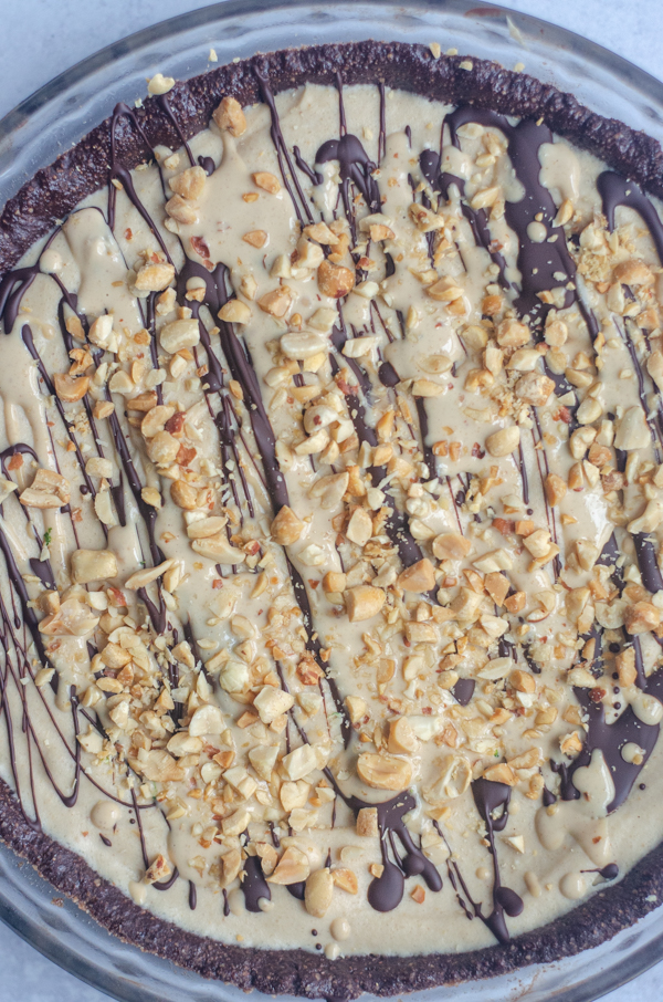 A fancy dessert you can make in just a few minutes of prep time, this peanut butter no-bake pie is super decadent! Paleo, keto, gluten-free.