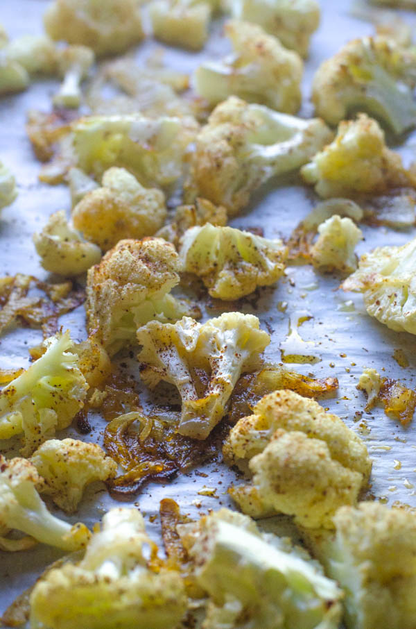 This super-tasty seasoned cauliflower with caramelized onions makes the perfect dinner side dish! Low-carb, paleo, Whole30, dairy-free, vegan.